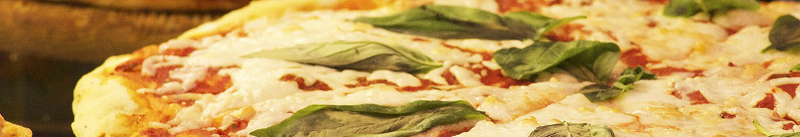 Eating Italian Pizza at Di Napoli Pizzeria restaurant in Westford, MA.